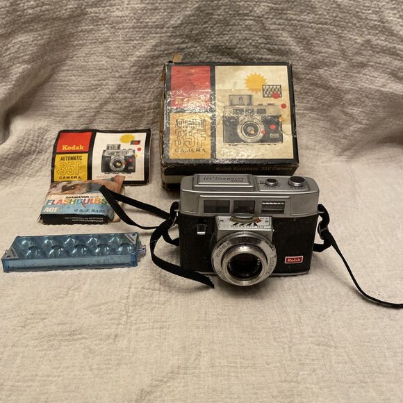 Kodak Automatic 35F Camera With Box And Sylviania Flashbulbs Vintage Untested